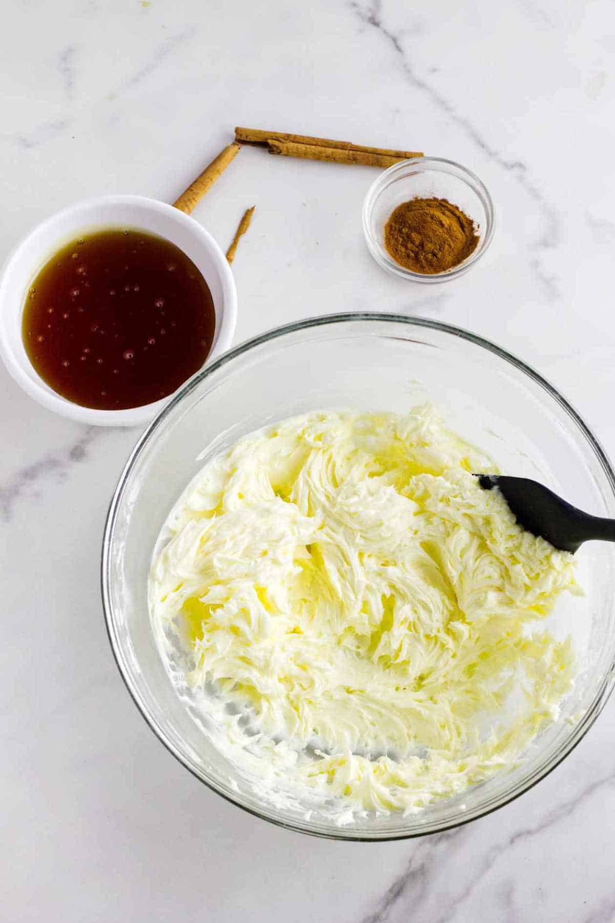 bowl of whipped butter, and ingredients nearby.