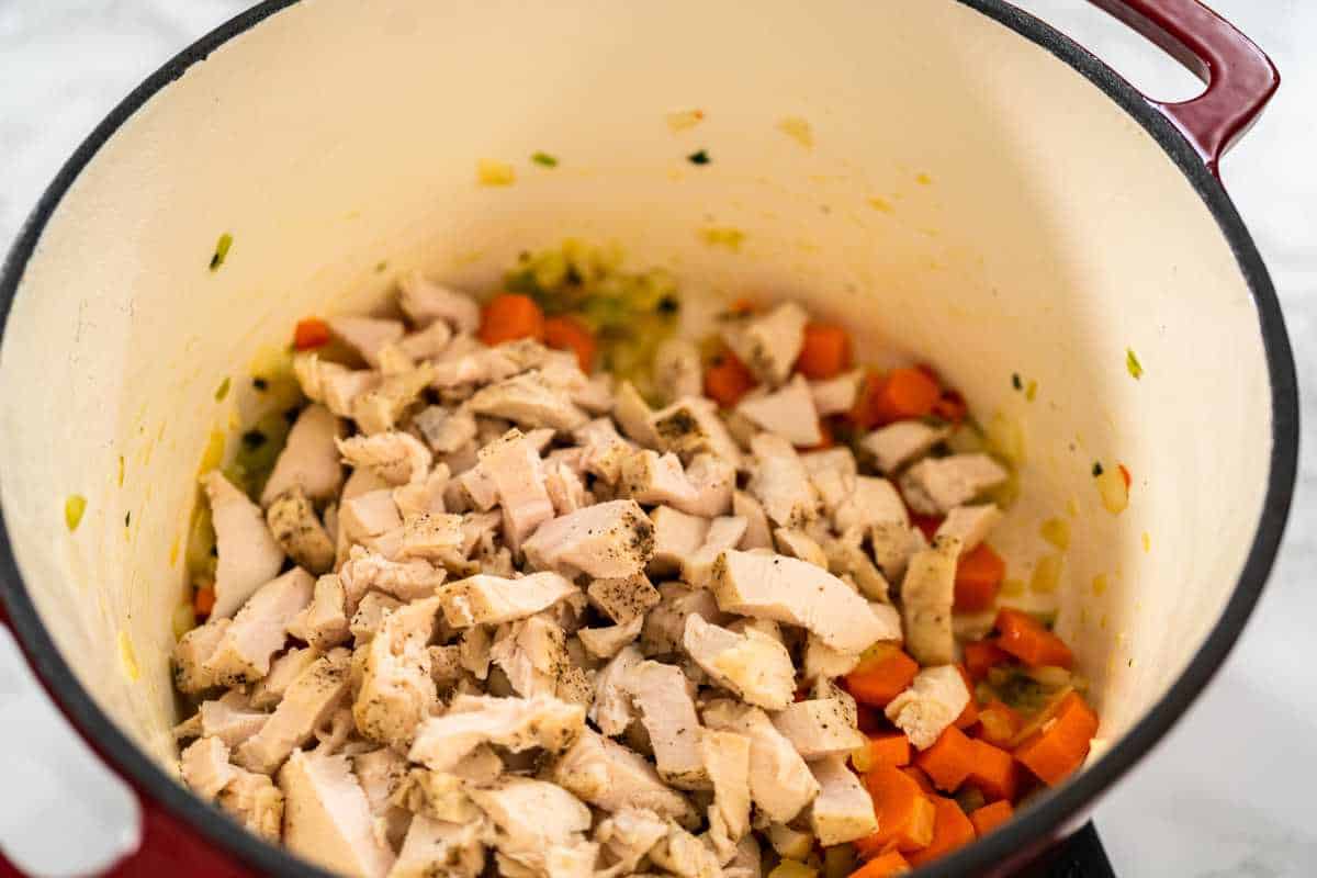 diced chicken added to sauteed vegetables.