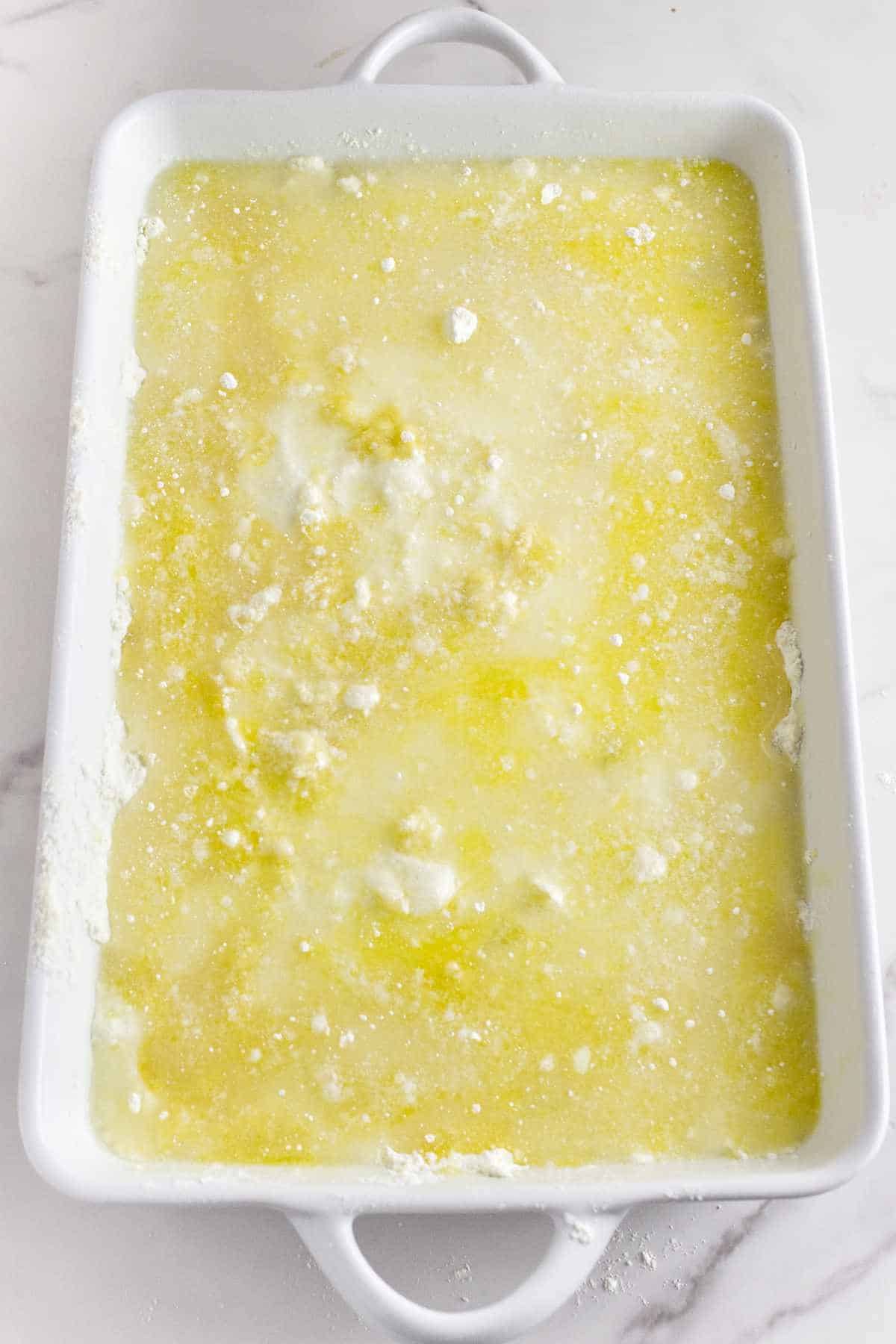dry cake mix topped with butter and water.