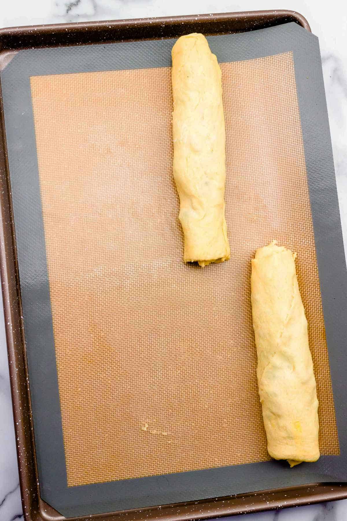 rolled up filling stuffed dough.