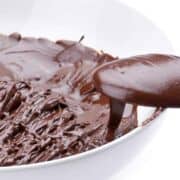 a bowl of chocolate syrup.