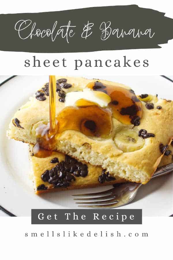 sheet pan chocolate chip pancakes with maple syrup drizzled on.