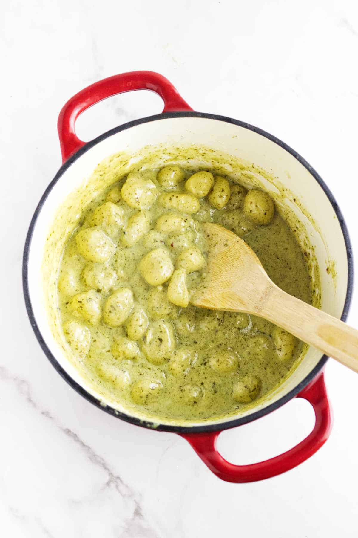 creamy thickened pesto sauce with gnoochi.