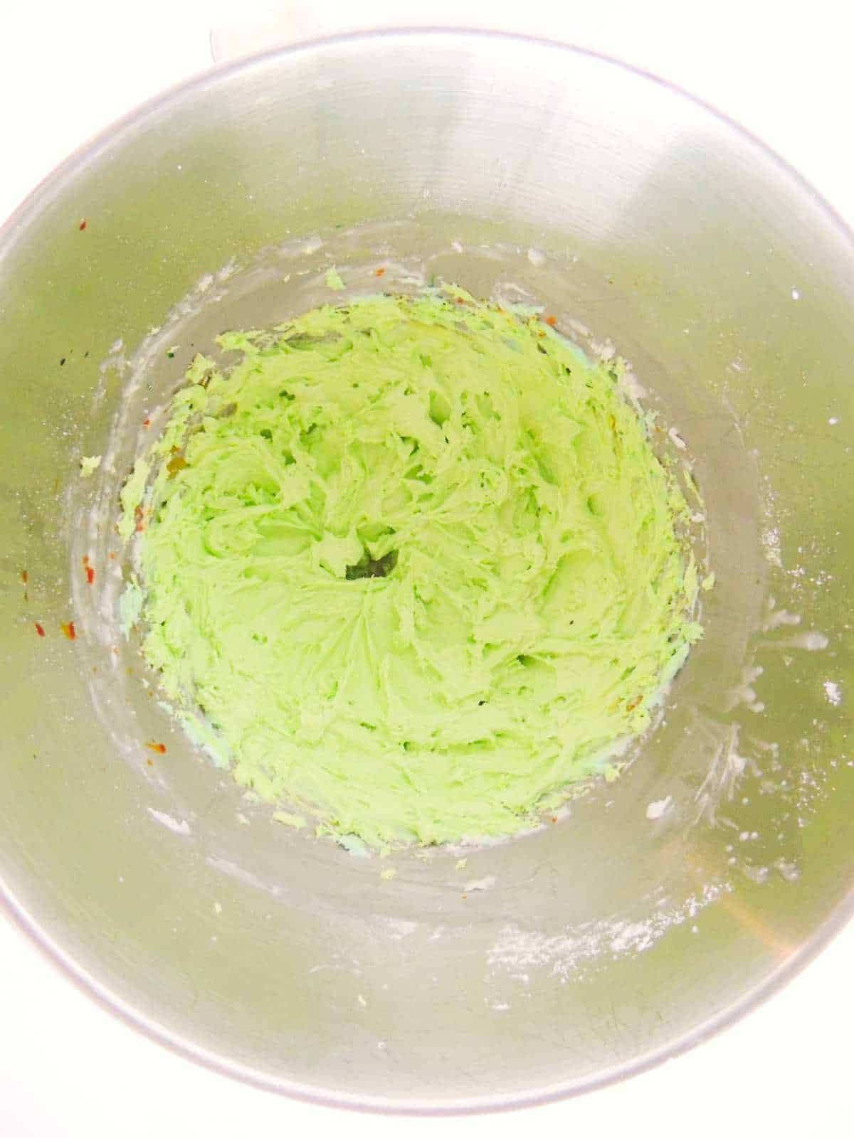 green frosting in a mixing bowl.