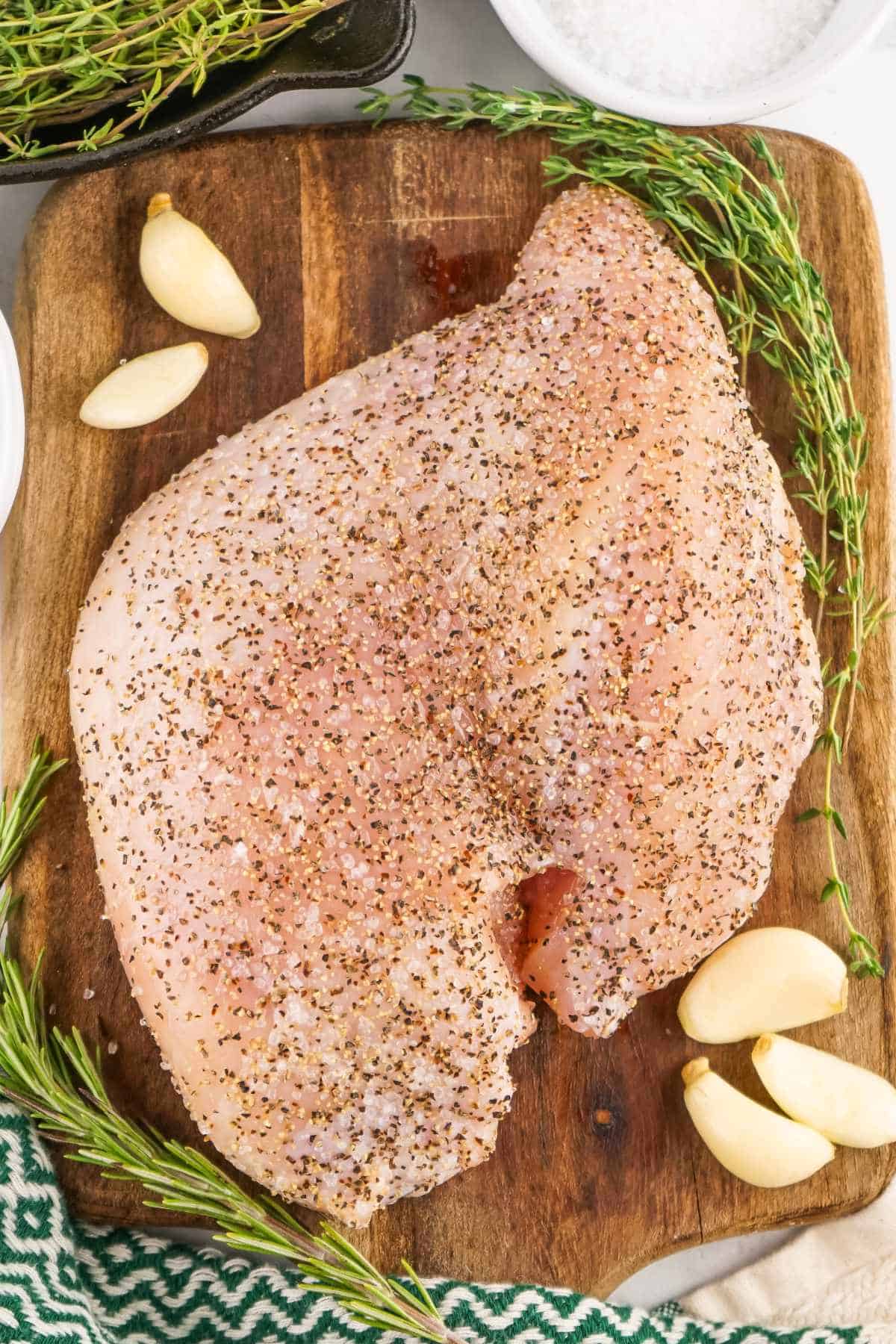 seasoned raw turkey breast.