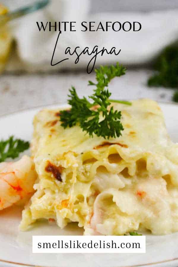white seafood lasagna on a plate.