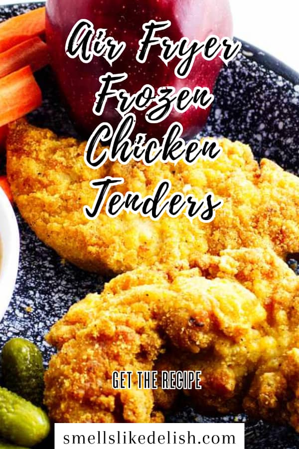 air fryer frozen chicken tenders on a plate with apple and carrot sticks.