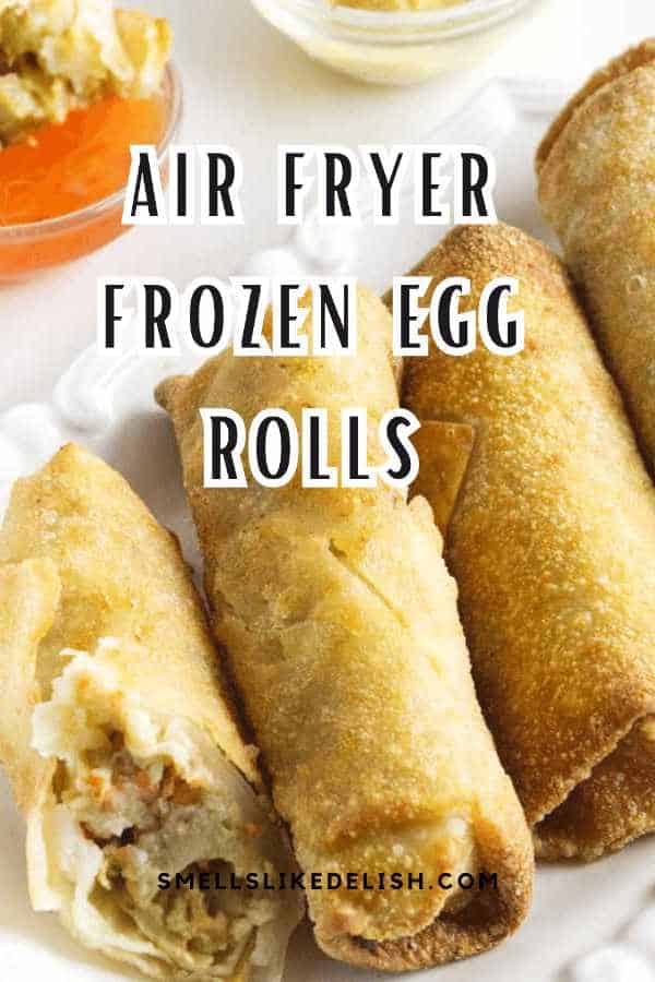 air fryer frozen egg rolls on a plate with dipping sauce.