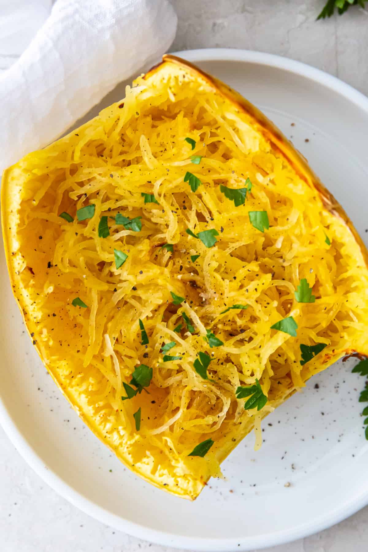 fluffed spaghetti squash with a fork in it.