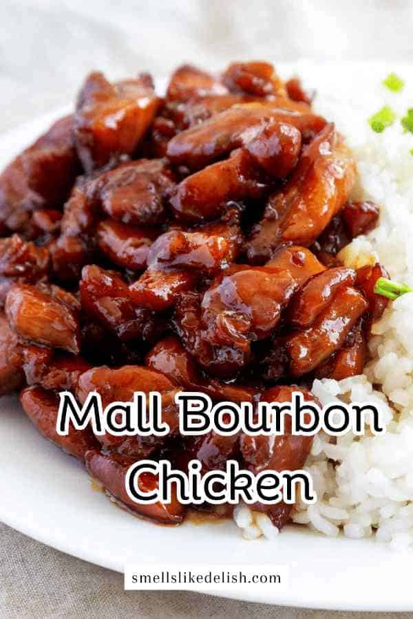 spicy Asian bourbon chicken on a plate of rice.