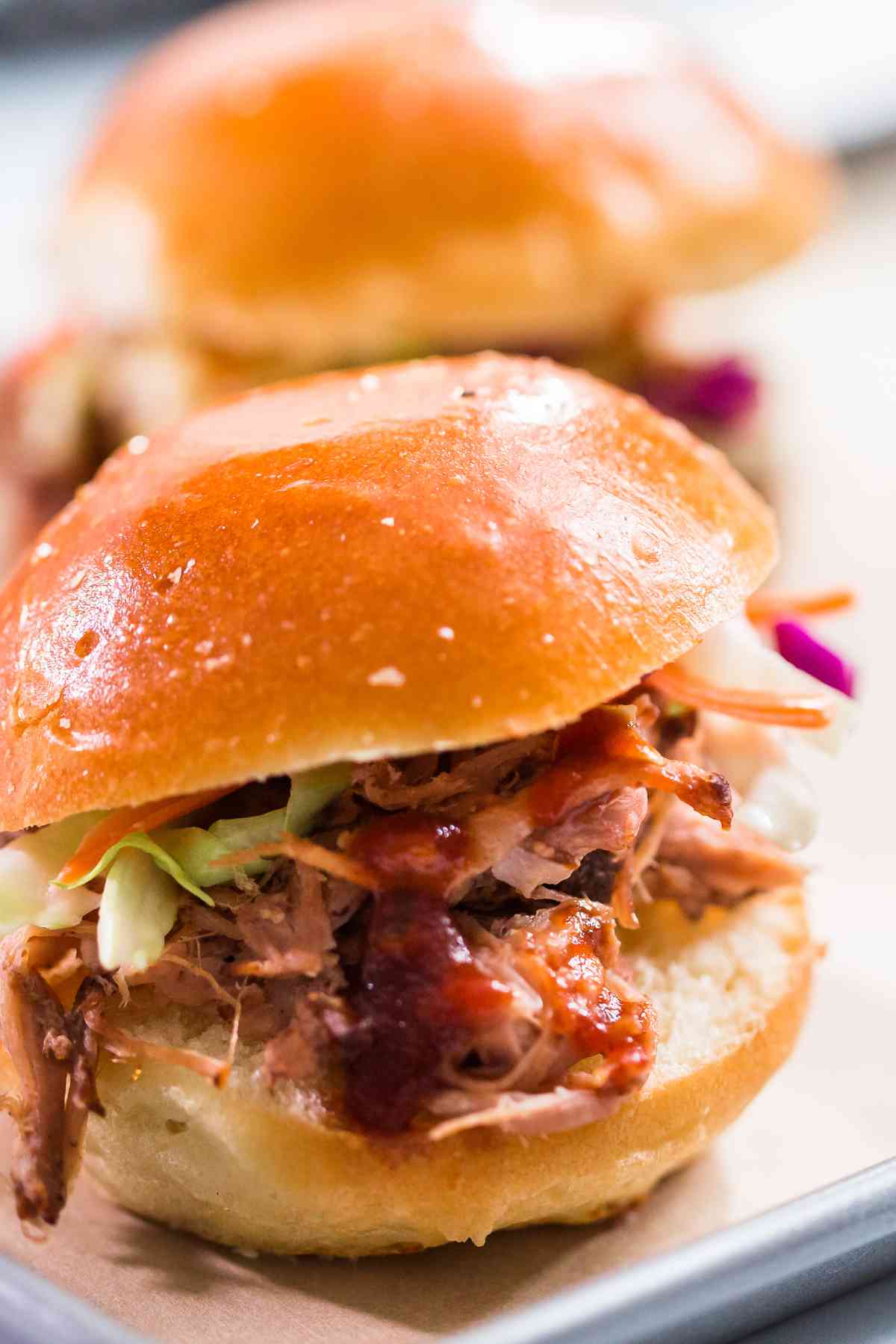 pulled pork sandwiches with coleslaw.