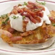 boxty, irish pancake with sour cream, bacon and parsley.