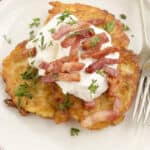 boxty, irish pancake with sour cream, bacon and parsley.