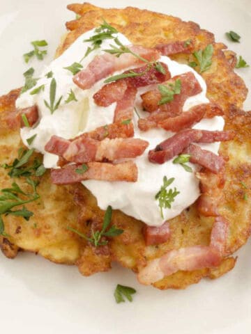 boxty, irish pancake with sour cream, bacon and parsley.
