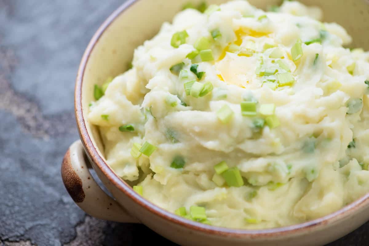 Green onions folded into mashed potatoes.