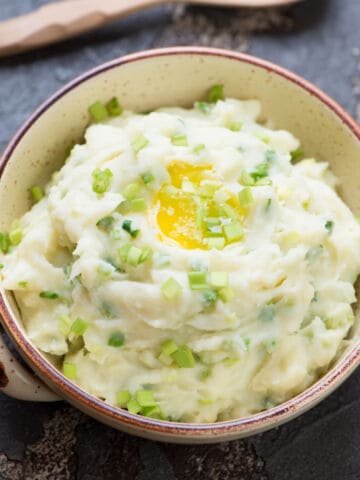 Irish champ or traditional mashed potato with green onion.