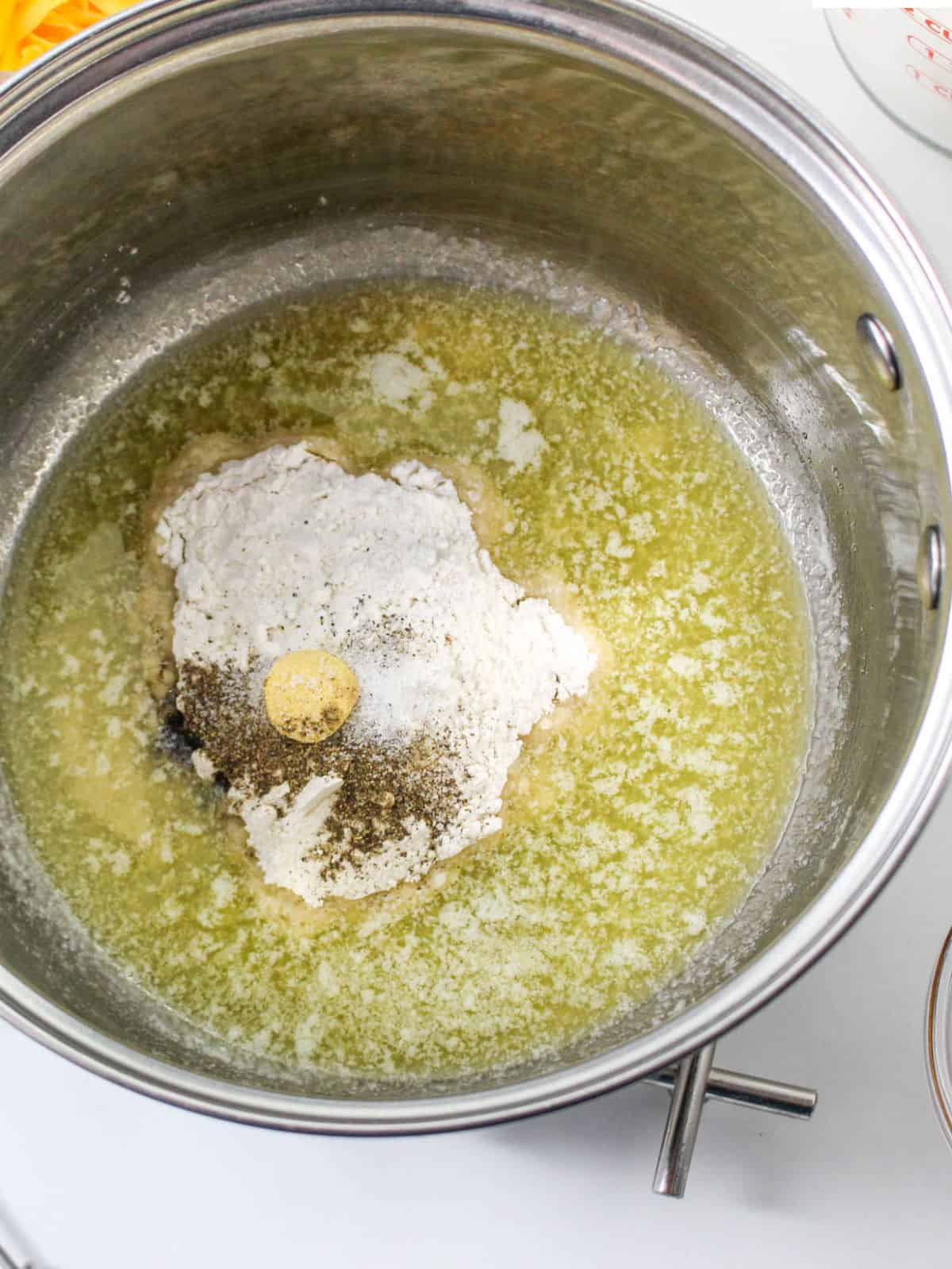 flour and seasonings added to melted butter for a roux.
