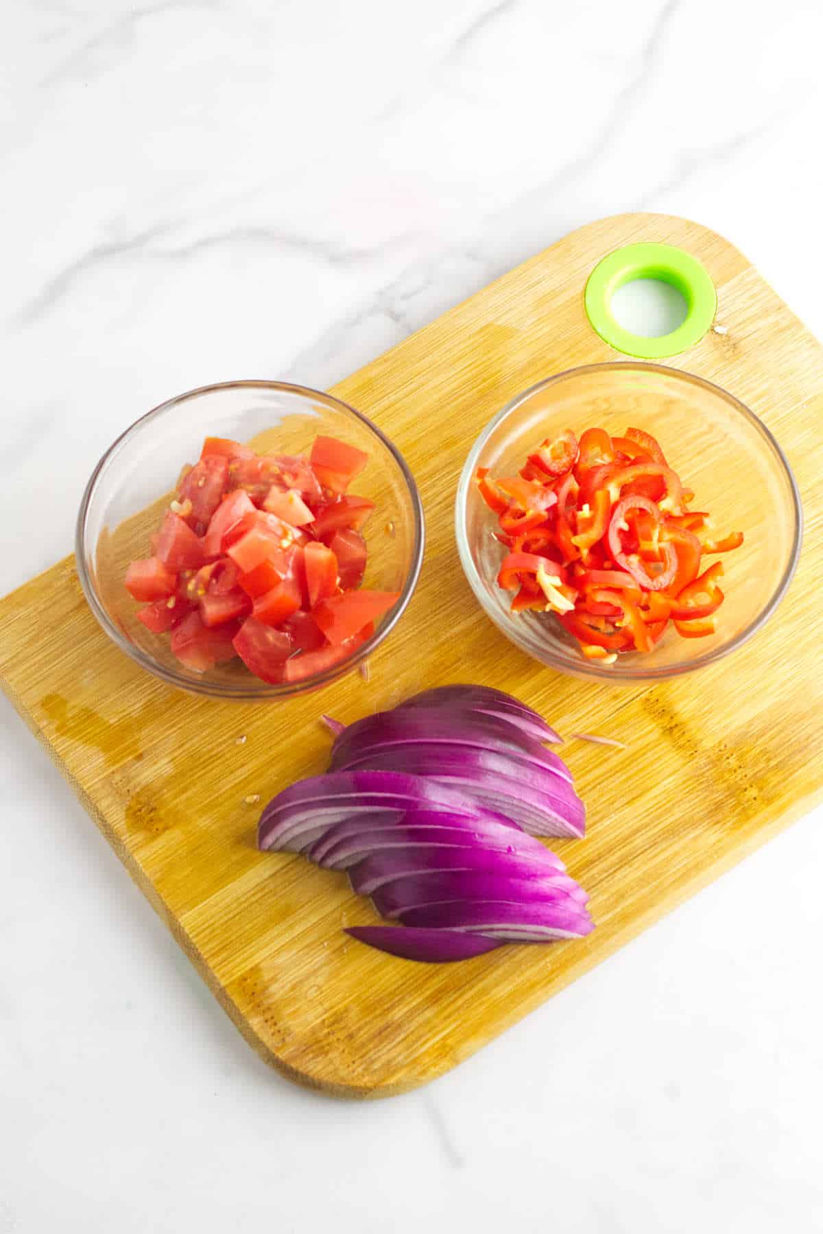 finely diced tomato, red onion, and sliced red chile peppers.