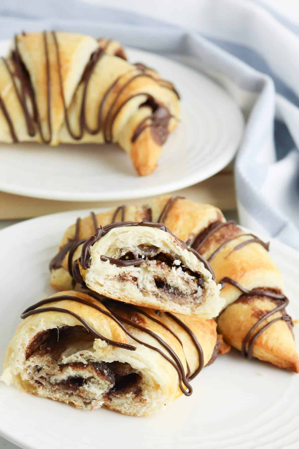 dessert plate with two crescent rolls.