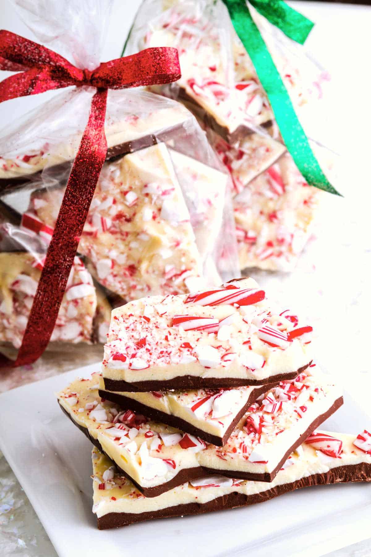 Holiday gift packages filled with chocolate peppermint bark candy.