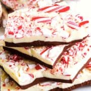 Holiday gift packages filled with chocolate peppermint bark candy.