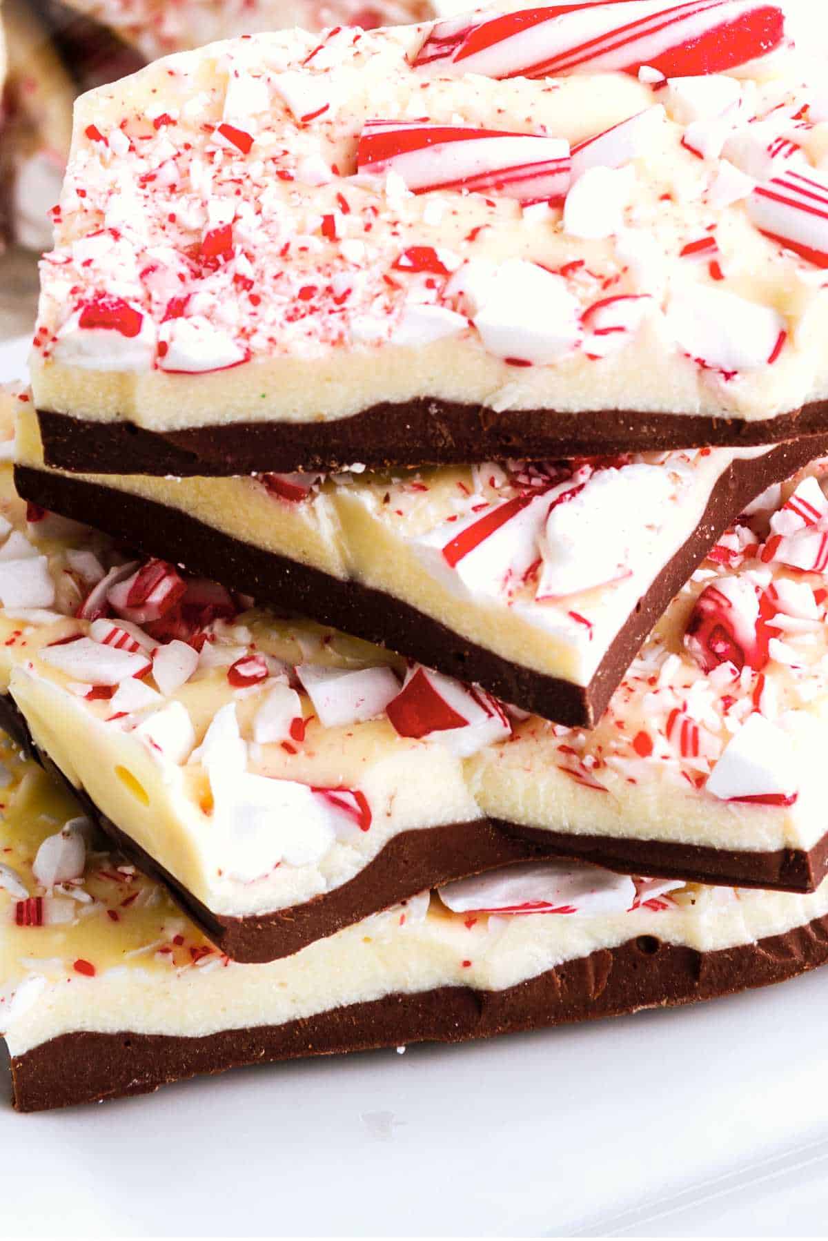Holiday gift packages filled with chocolate peppermint bark candy.