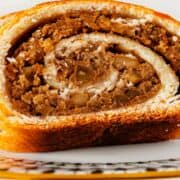 slices of baked apple and walnut beigli.