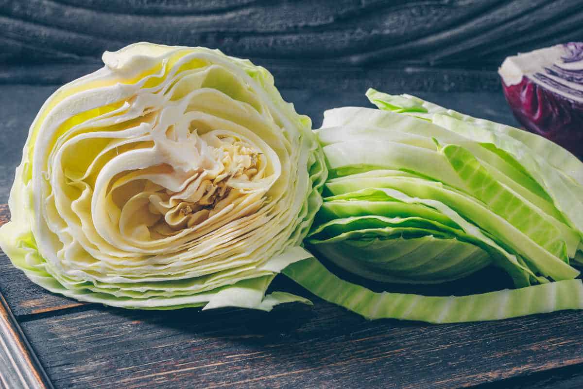 cutting a head of cabbage.