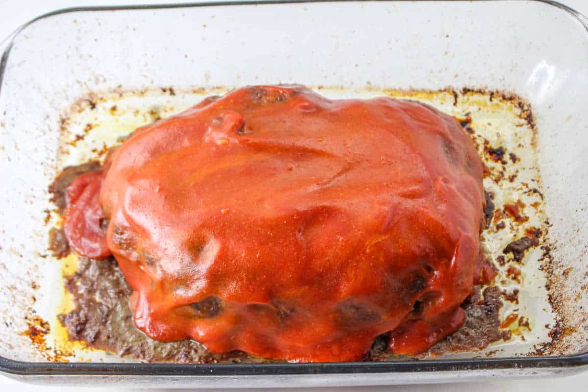 baking pan with catsup coated meatloaf.