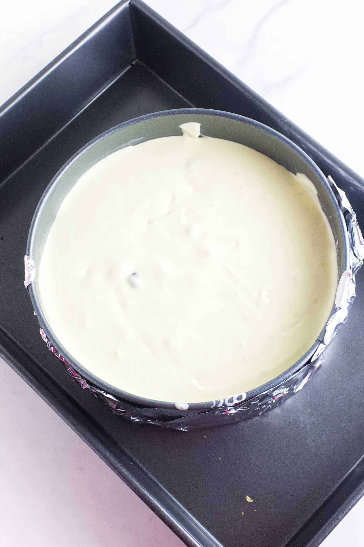 cheesecake in a bain marie for baking.