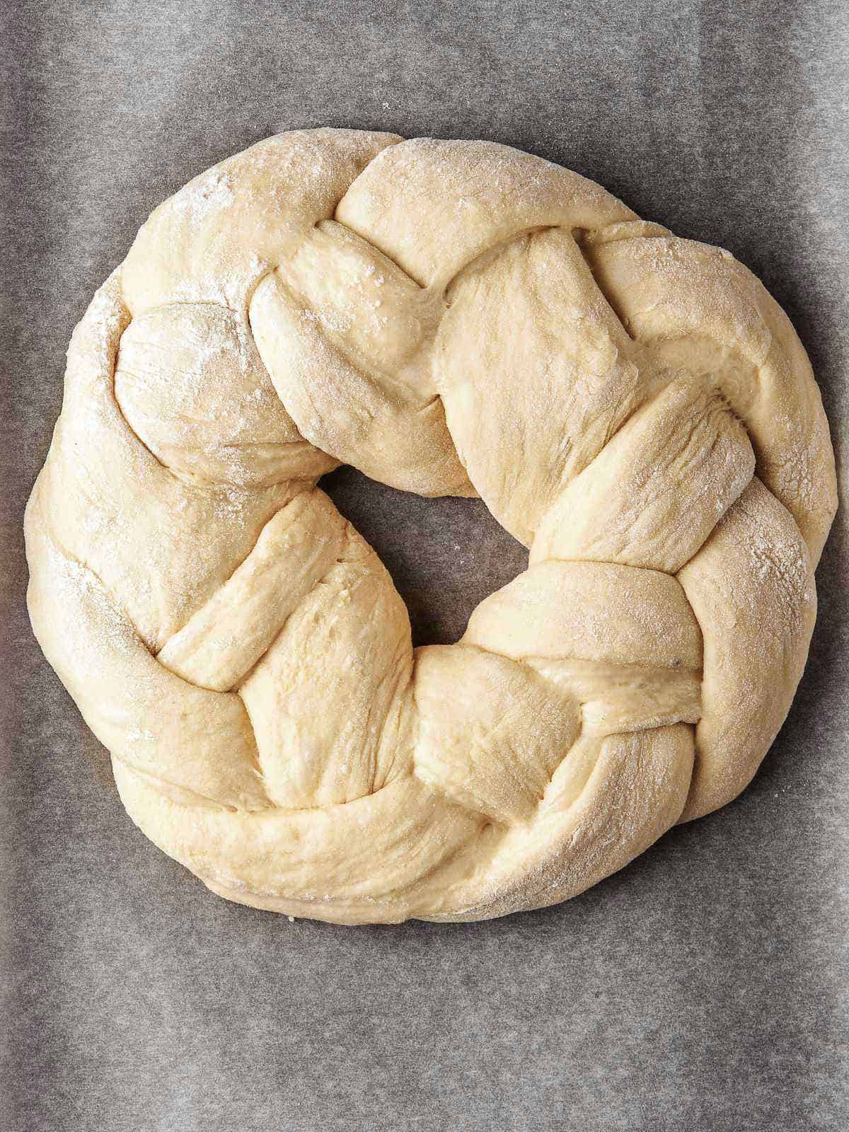 Preparation of the round braided tsoureki bread.