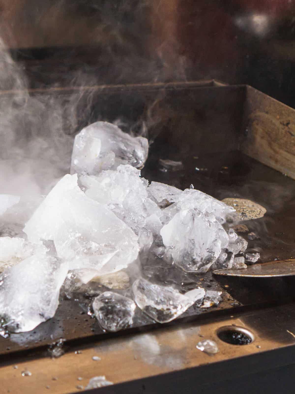 Using ice on a hot griddle is useful for cleaning grease, and stuck-on residue.