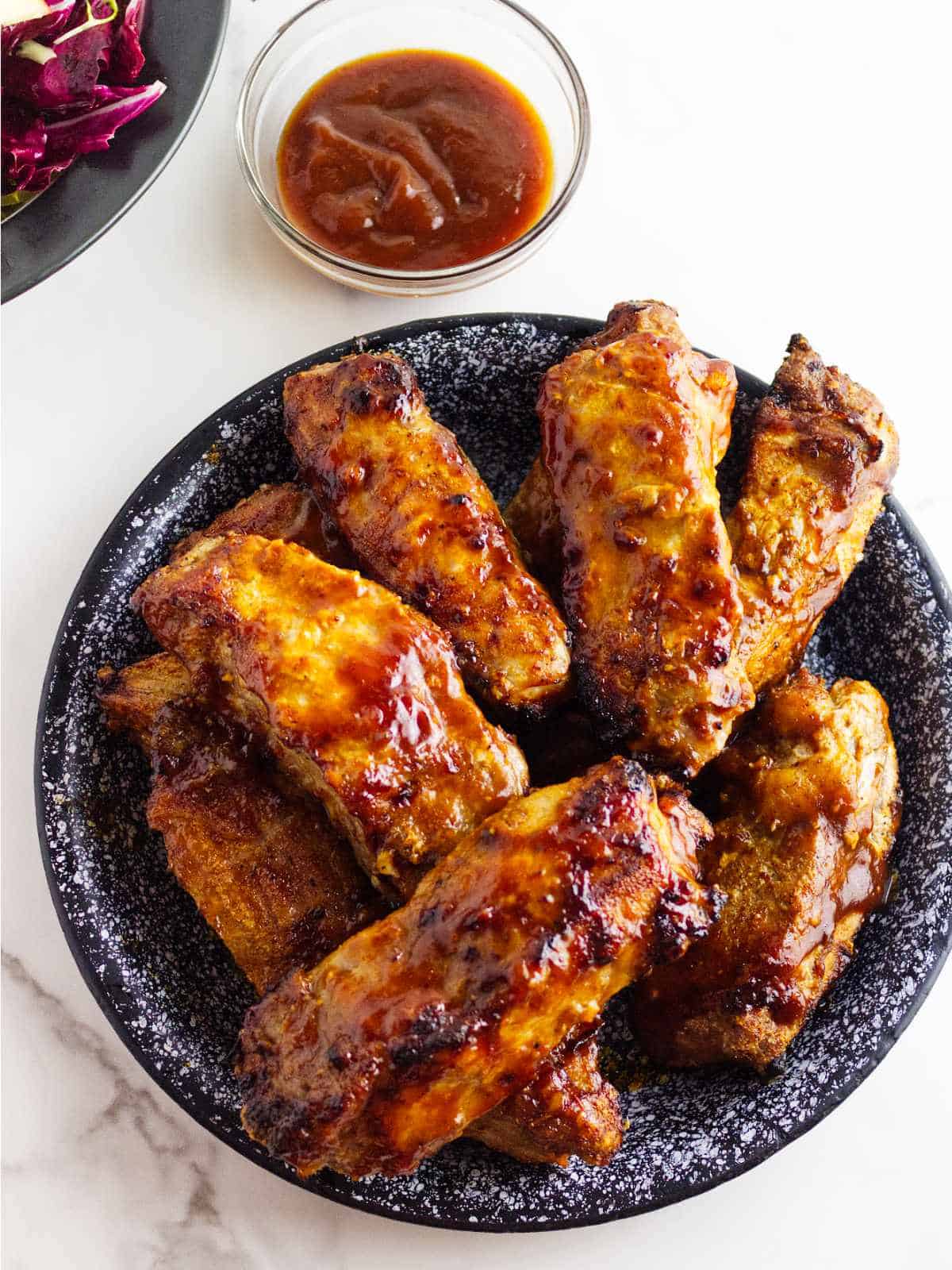 air fried country pork ribs with barbecue sauce.