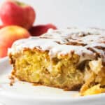 Moist apple loaf cake on a platter.