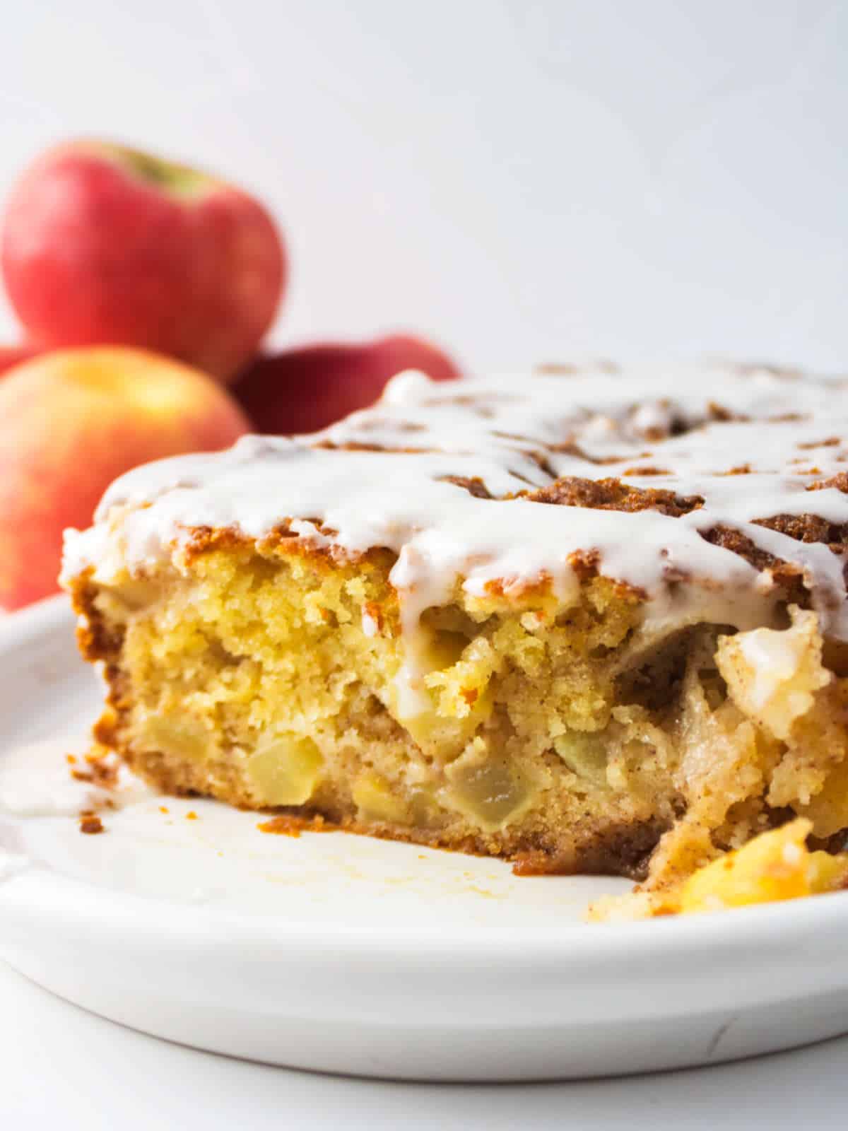 Moist apple loaf cake on a platter.