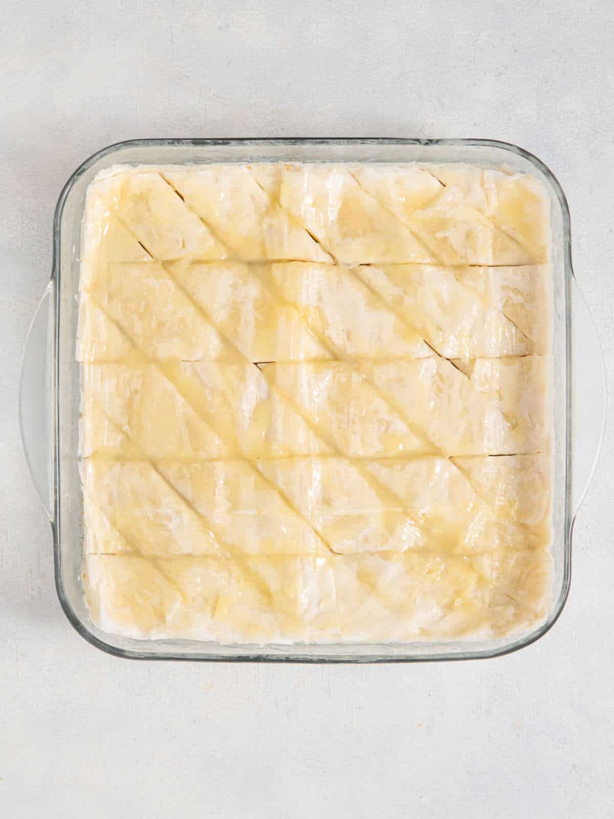 Cut baklava diagonally with a sharp knife.