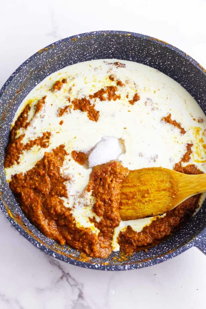 Cream added to butter chicken sauce base.
