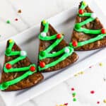 Christmas tree brownies on a serving platter.