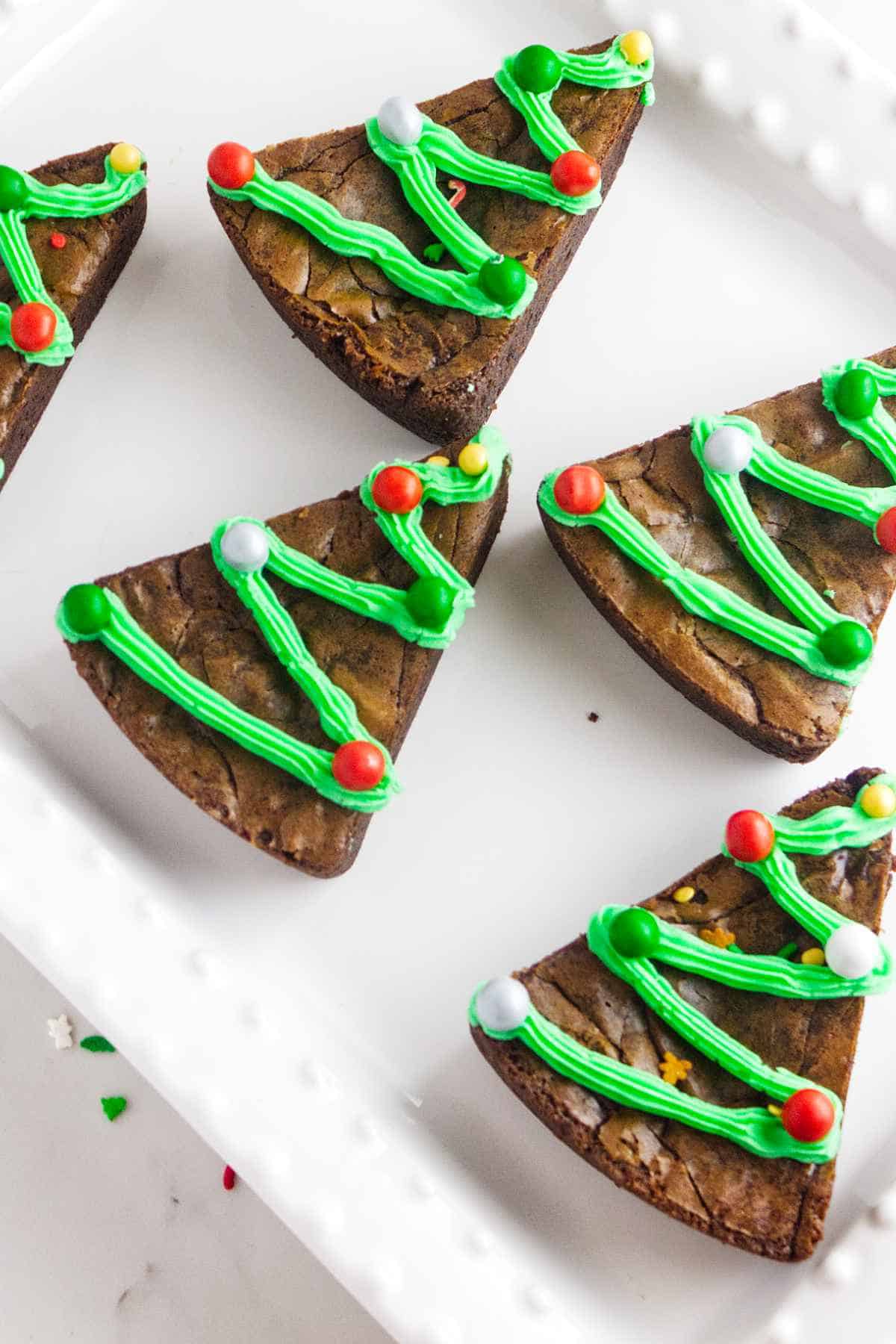 Christmas tree brownies on a serving platter.