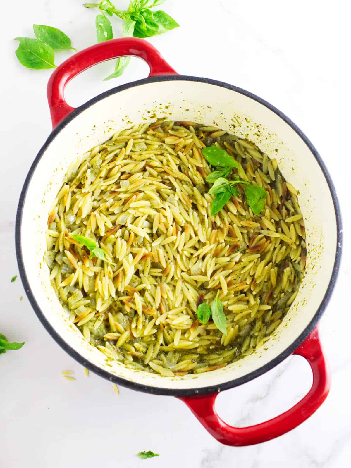 Orzo pilaf in a dutch oven.