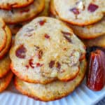 stack of date cookies on a plate.