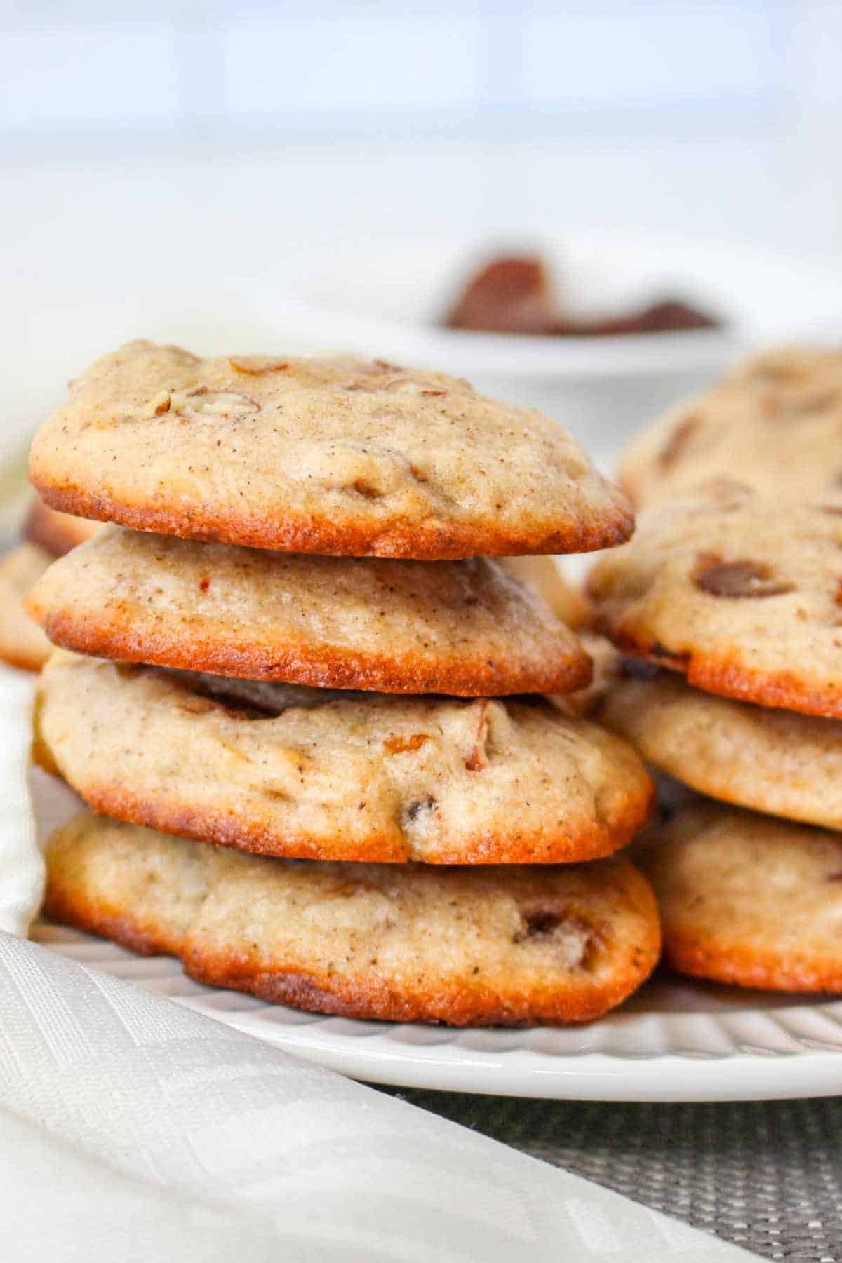 stack of date cookies on a plate.