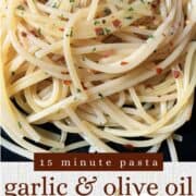 bowl of garlic and olive oil pasta with red pepper flakes.