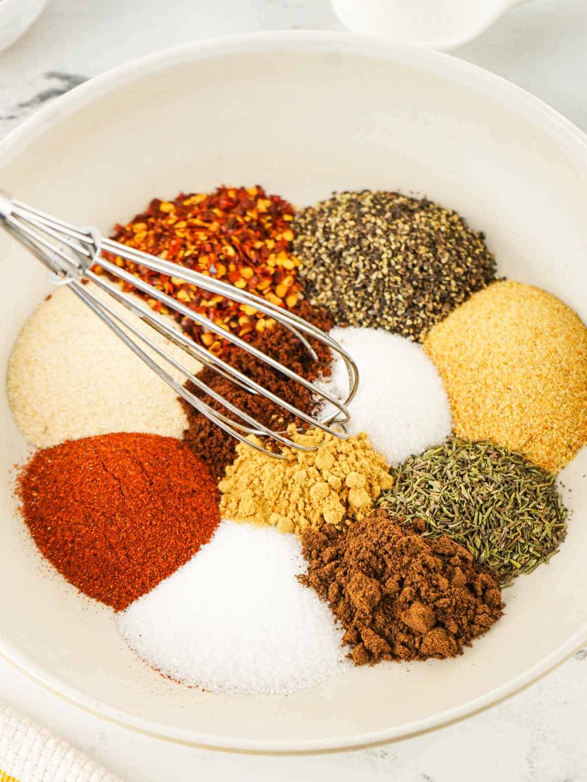 measured ingredients for making a Jamaican Jerk spice blend.
