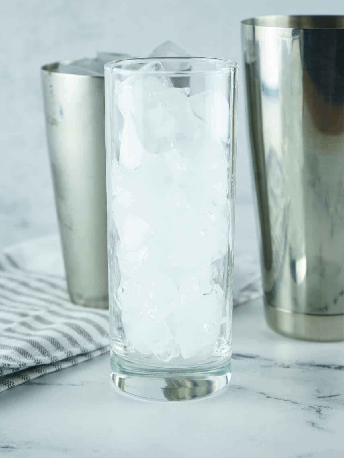 filling a glass with ice.