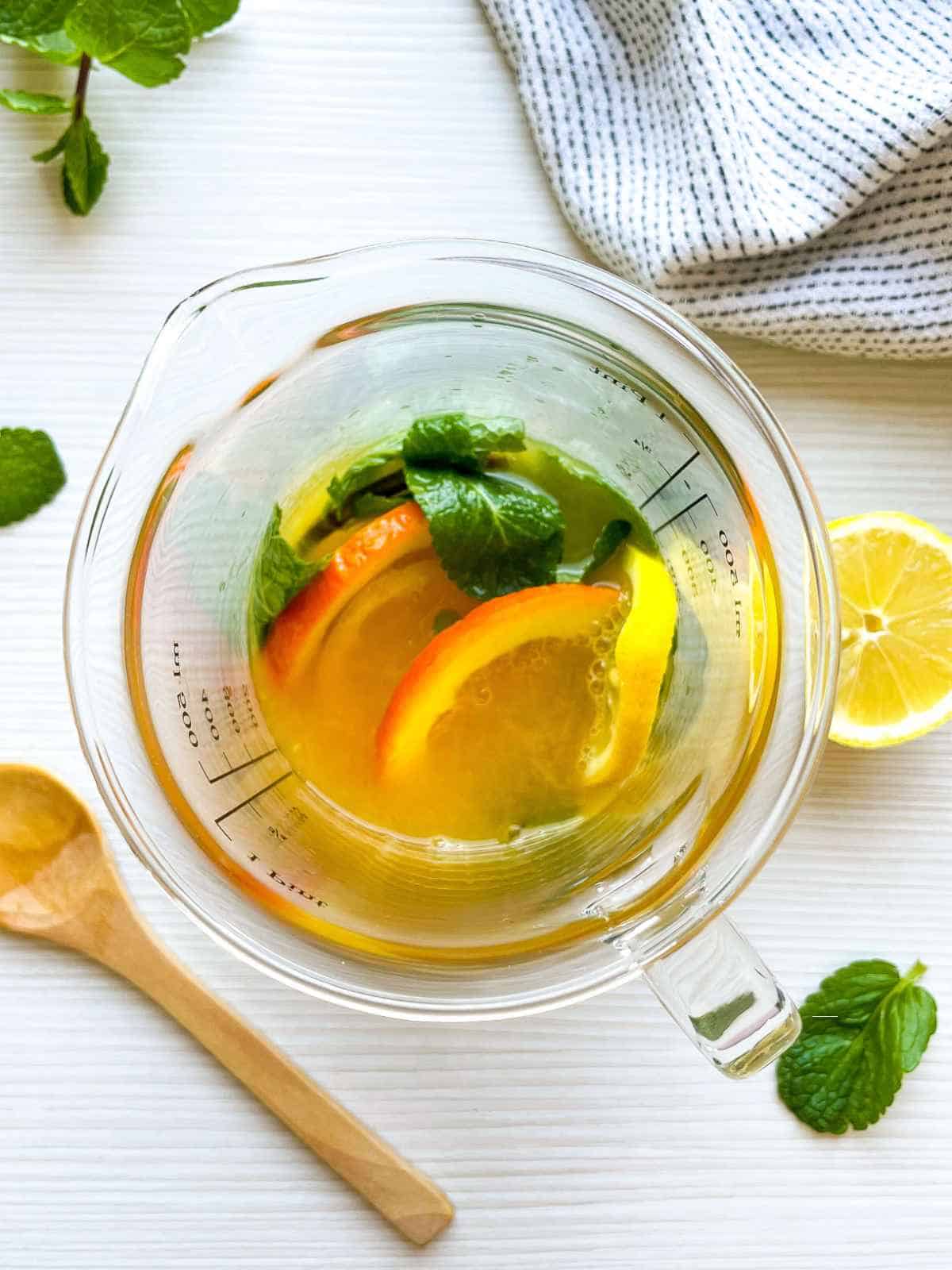 pitcher of orange mint lemonade.