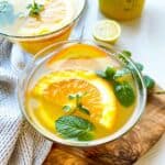 Orange mint lemonade in a glass.