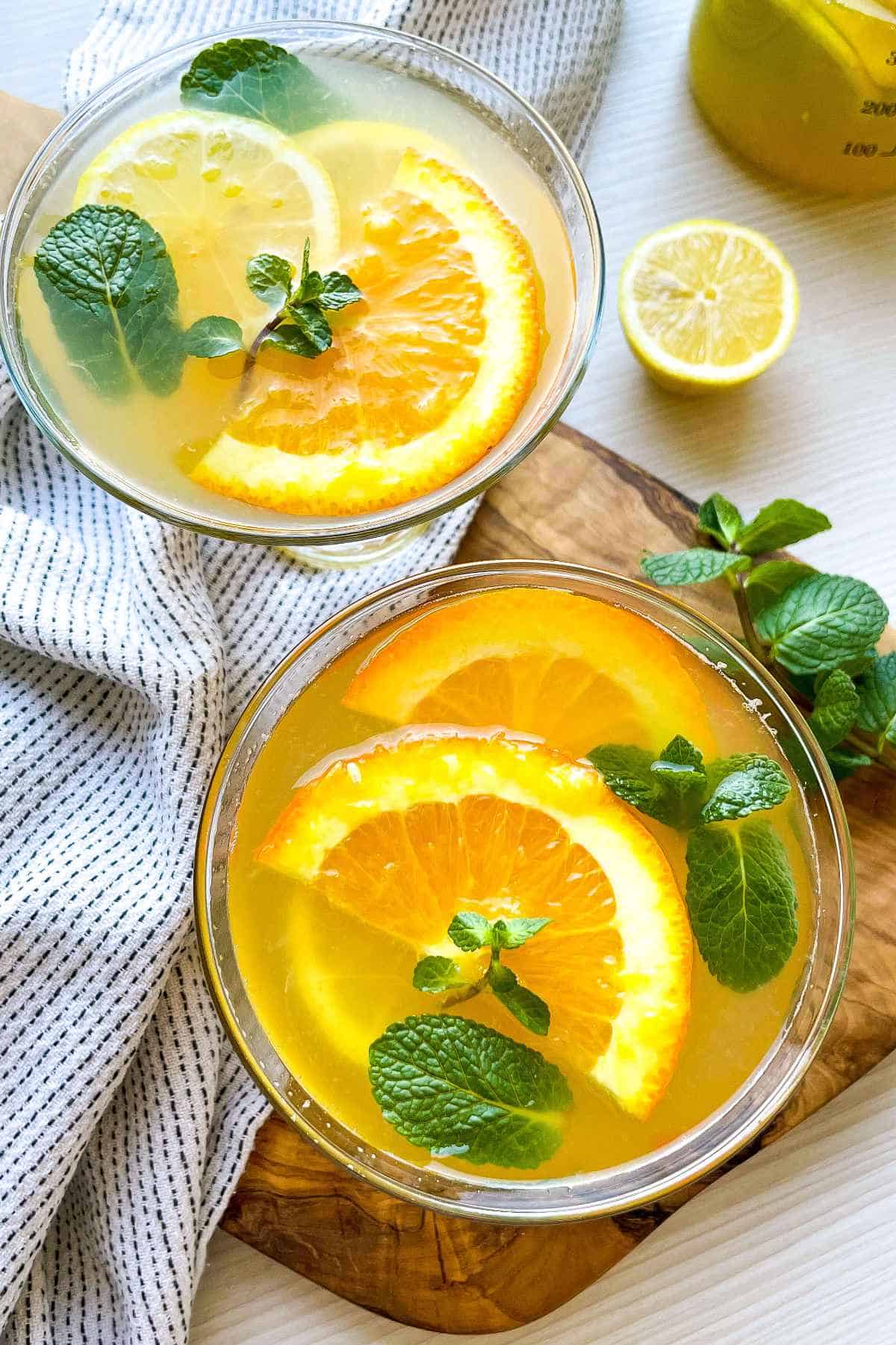 Orange mint lemonade in a glass.