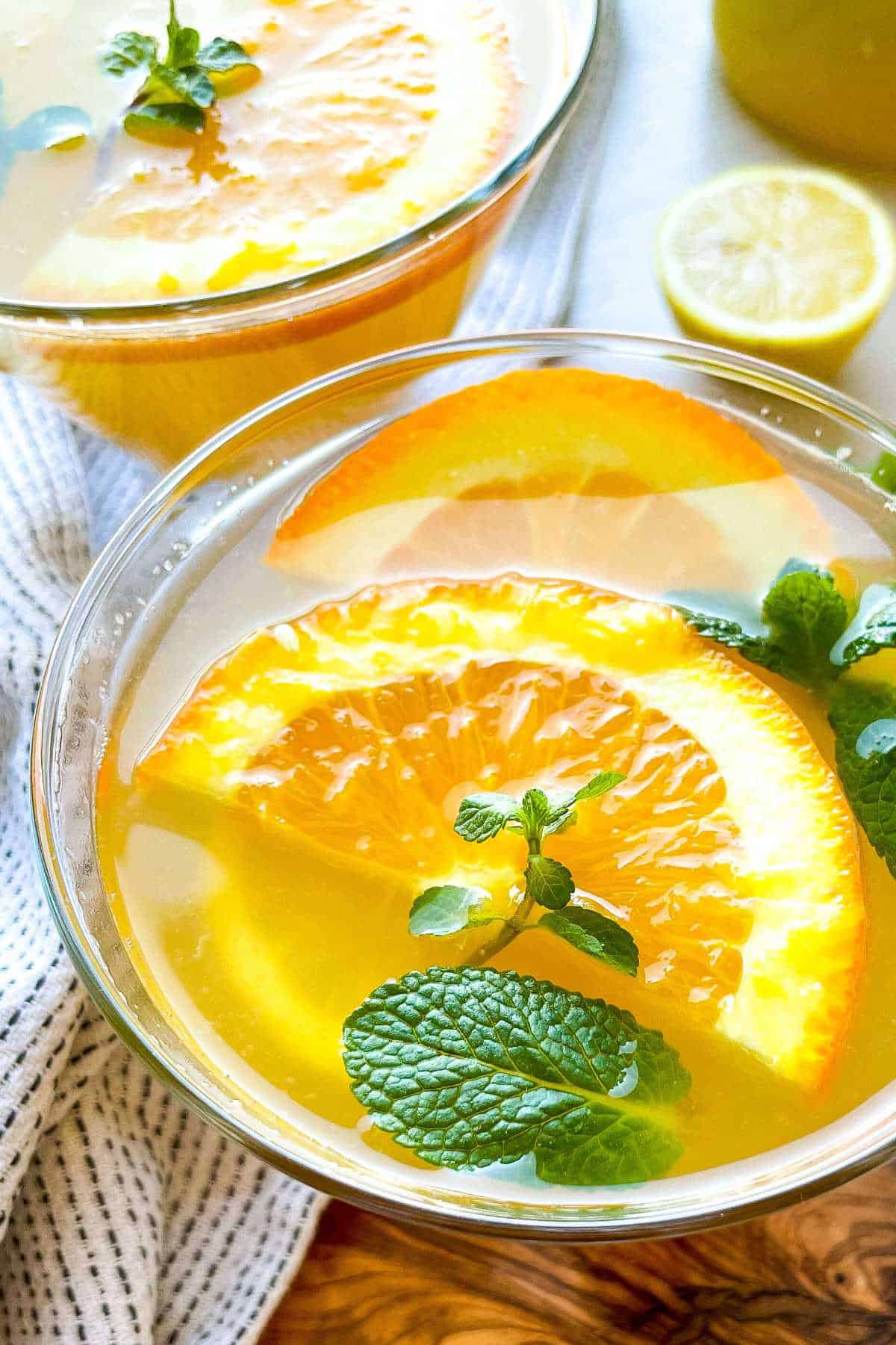 Orange mint lemonade in a glass.