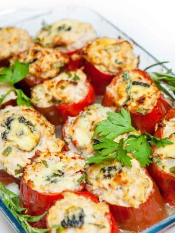 Stuffed pepper with chicken fillet, brown rice and vegetables and herbs.